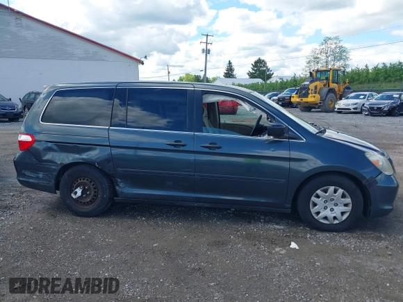2005 Honda Odyssey LX with VIN 5FNRL38205B128740, listed as a IAAI auction lot 42209974 with 183,014 mi miles and . Bid and sale history available at DreamBid. Image 13.