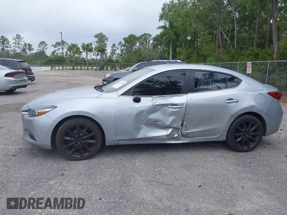 2017 Mazda 3 Touring with VIN 3MZBN1V76HM108148, listed as a IAAI auction lot 41911568 with 194,363 mi miles and . Bid and sale history available at DreamBid. Image 6.
