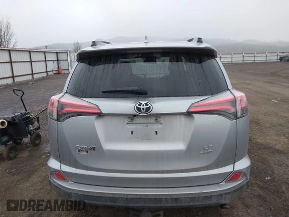2018 Toyota RAV4 LE with VIN 2T3BFREV9JW724606, listed as a IAAI auction lot 41862028 with 98,590 mi miles. Bid and sale history available at carsss.com. Image 16.