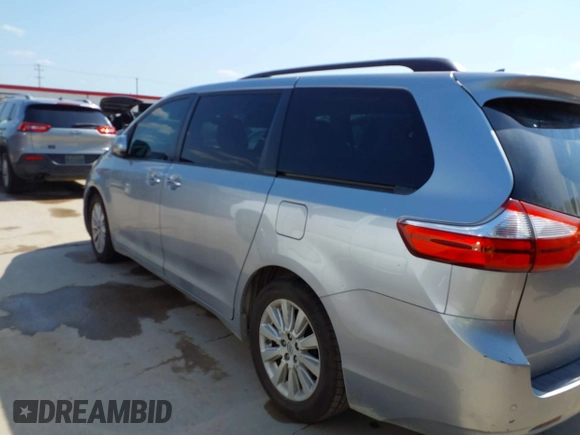 2016 Toyota Sienna XLE with VIN 5TDYK3DC5GS763674, listed as a IAAI auction lot 42035115 with 133,120 mi miles. Bid and sale history available at carsss.com. Image 14.
