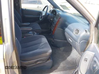 2003 Chrysler Town & Country LX with VIN 2C4GP44L03R203678, listed as a IAAI auction lot 41293296 with 210,827 mi miles and . Bid and sale history available at DreamBid. Image 5.