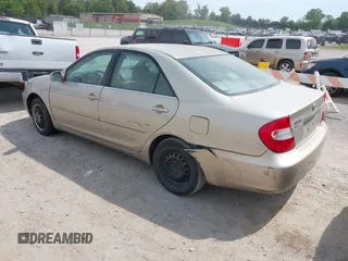 2004 Toyota Camry LE with VIN 4T1BE32K14U846576, listed as a IAAI auction lot 42086537 with 202,027 mi miles. Bid and sale history available at carsss.com. Image 3.