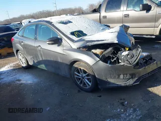 2015 Ford Focus SE with VIN 1FADP3F24FL276766, listed as a IAAI auction lot 41388348 with 59,579 mi miles. Bid and sale history available at carsss.com. Image 1.