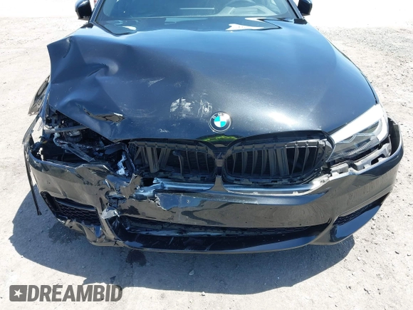 2018 BMW 5 Series 530i z VIN WBAJA5C51JWA56680, wystawiony jako IAAI lot #42273066 z przebiegiem 39 789 mil mil oraz . Historia ofert i sprzedaży dostępna na DreamBid. Obrazek 6.