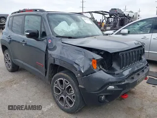 2022 Jeep Renegade Trailhawk z VIN ZACNJDC10NPN62719, wystawiony jako IAAI lot #42057302 z przebiegiem 52 405 mil mil oraz . Historia ofert i sprzedaży dostępna na DreamBid. Obrazek 1.