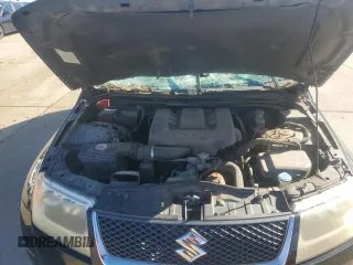 2007 Suzuki Grand Vitara z VIN JS3TE941X74202046, wystawiony jako Copart lot #80221394 z przebiegiem 153 791 mil mil oraz Szkoda całkowita • Salvage title. Historia ofert i sprzedaży dostępna na DreamBid. Obrazek 12.