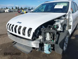 2018 Jeep Cherokee Latitude Plus with VIN 1C4PJLLB0JD584971, listed as a IAAI auction lot 41460976 with 64,100 mi miles. Bid and sale history available at carsss.com. Image 6.