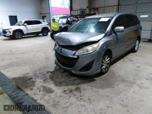 2013 Mazda 5 Sport with VIN JM1CW2BL5D0156684, listed as a IAAI auction lot 41966696 with 121,654 mi miles and . Bid and sale history available at DreamBid. Image 2.