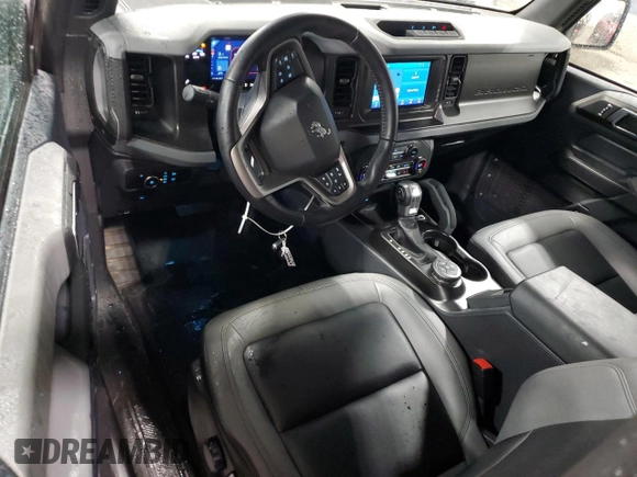2023 Ford Bronco z VIN 1FMDE5AH9PLB83620, wystawiony jako Copart lot #60644035 z przebiegiem 6 700 mil mil oraz Szkoda całkowita • Salvage title. Historia ofert i sprzedaży dostępna na DreamBid. Obrazek 8.