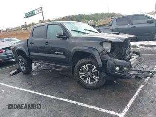 2019 Toyota Tacoma SR z VIN 3TMCZ5ANXKM191226, wystawiony jako IAAI lot #41518271 z przebiegiem 50 686 mil mil oraz . Historia ofert i sprzedaży dostępna na DreamBid. Obrazek 1.