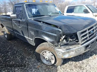 1996 Ford F-250 with VIN 2FTHF26F2TCA61615, listed as a IAAI auction lot 41646849 with 135,321 mi miles. Bid and sale history available at carsss.com. Image 6.