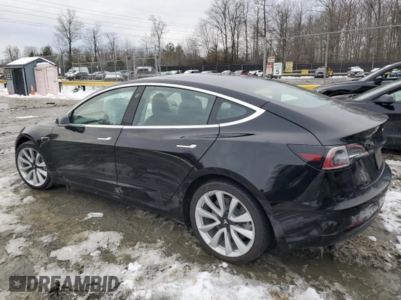 2020 Tesla Model 3 Standard Range Plus with VIN 5YJ3E1EAXLF661031, listed as a Copart auction lot 87912605 with Not Provided miles and Salvage Title. Bid and sale history available at DreamBid. Image 2.