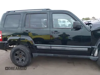 2012 Jeep Liberty Sport with VIN 1C4PJMAK5CW145393, listed as a IAAI auction lot 41558487 with 133,212 mi miles. Bid and sale history available at carsss.com. Image 13.