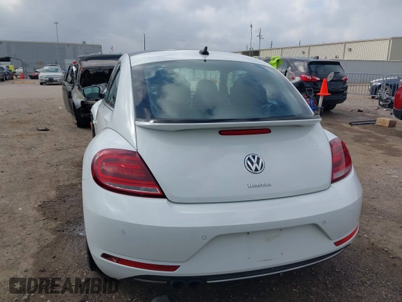 2019 Volkswagen Beetle S with VIN 3VWFD7AT2KM701622, listed as a IAAI auction lot 41520300 with Not provided miles and . Bid and sale history available at DreamBid. Image 17.