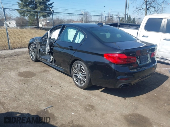 2019 BMW 5 Series M550i xDrive with VIN WBAJB9C51KB464879, listed as a IAAI auction lot 41774834 with 77,379 mi miles and . Bid and sale history available at DreamBid. Image 3.