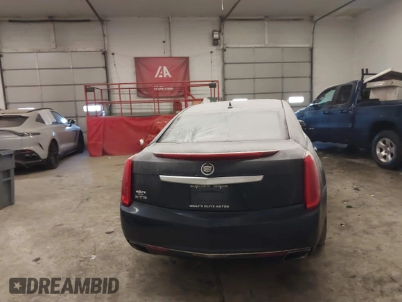 2013 Cadillac XTS Luxury with VIN 2G61P5S34D9200849, listed as a IAAI auction lot 41412189 with 134,932 mi miles. Bid and sale history available at carsss.com. Image 16.