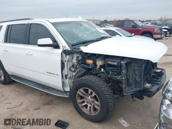 2015 GMC Yukon XL SLT with VIN 1GKS1HKCXFR652337, listed as a IAAI auction lot 41330287 with 139,268 mi miles. Bid and sale history available at carsss.com. Image 1.