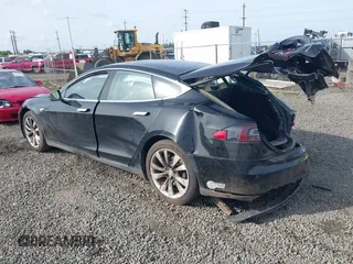 2014 Tesla Model S 60 with VIN 5YJSA1H12EFP53787, listed as a IAAI auction lot 42279493 with 168,859 mi miles and . Bid and sale history available at DreamBid. Image 3.