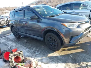 2017 Toyota RAV4 LE with VIN 2T3BFREV6HW574920, listed as a IAAI auction lot 41274795 with 128,696 mi miles and . Bid and sale history available at carsss.com. Image 1.