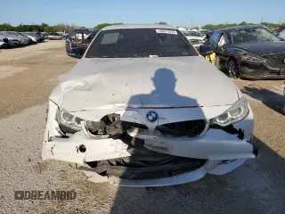 2014 BMW 4 Series 428i with VIN WBA3V7C54EJ872582, listed as a Copart auction lot 49071974 with 104,391 mi miles and Clean title. Bid and sale history available at DreamBid. Image 5.