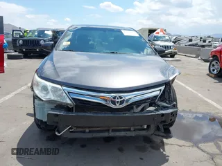 2014 Toyota Camry L with VIN 4T1BF1FK0EU853905, listed as a IAAI auction lot 42217834 with 108,612 mi miles and . Bid and sale history available at DreamBid. Image 12.