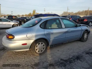 1997 Ford Taurus G with VIN 1FALP51U8VA192556, listed as a Copart auction lot 77604464 with 114,830 mi miles and Salvage Title. Bid and sale history available at carsss.com. Image 3.