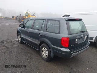 2003 Honda Pilot LX with VIN 2HKYF181X3H610581, listed as a IAAI auction lot 41743077 with 212,207 mi miles and . Bid and sale history available at DreamBid. Image 3.