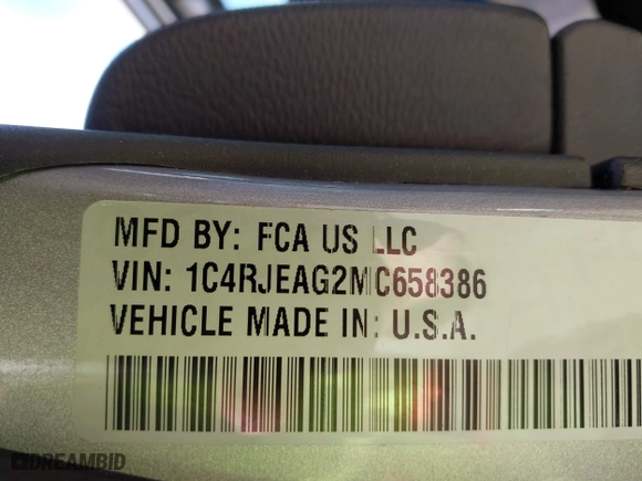 2021 Jeep Grand Cherokee Laredo X with VIN 1C4RJEAG2MC658386, listed as a IAAI auction lot 41218224 with 92,901 mi miles. Bid and sale history available at carsss.com. Image 9.
