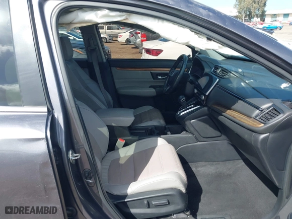 2019 Honda CR-V Touring with VIN 7FARW1H99KE005270, listed as a IAAI auction lot 41762812 with 122,583 mi miles. Bid and sale history available at carsss.com. Image 5.