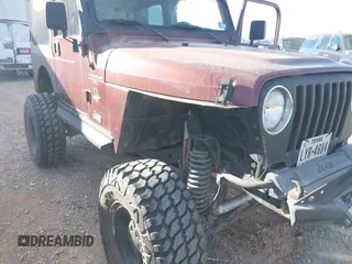 2001 Jeep Wrangler Sahara with VIN 1J4FA59S71P326941, listed as a IAAI auction lot 41648420 with 128,464 mi miles. Bid and sale history available at carsss.com. Image 6.