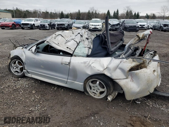 1997 Mitsubishi Eclipse GS with VIN 4A3AX35G5VE160888, listed as a Copart auction lot 80085414 with 163,683 mi miles and Salvage Title. Bid and sale history available at carsss.com. Image 2.