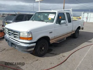 1996 Ford F-150 with VIN 1FTEX14N9TKA35772, listed as a IAAI auction lot 40963486 with 1 mi miles. Bid and sale history available at carsss.com. Image 2.