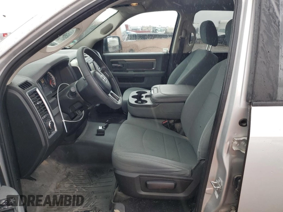 2018 Ram 1500 SLT z VIN 1C6RR6GG9JS317288, wystawiony jako Copart lot #50593095 z przebiegiem 128 698 mil mil oraz Szkoda całkowita • Salvage title. Historia ofert i sprzedaży dostępna na DreamBid. Obrazek 7.