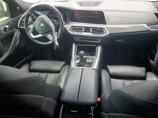 2020 BMW X6 xDrive40i z VIN 5UXCY6C03L9B94299, wystawiony jako Copart lot #53857965 z przebiegiem 54 133 mil mil oraz Szkody całkowita. Historia ofert i sprzedaży dostępna na DreamBid. Obrazek 8.