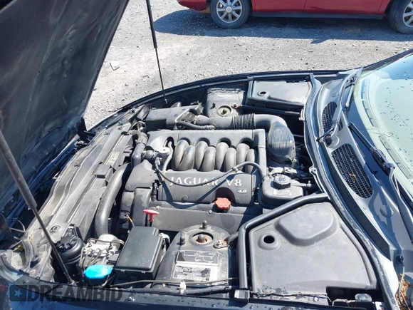 2002 Jaguar XK with VIN SAJDA42C12NA30499, listed as a IAAI auction lot 41954577 with 77,152 mi miles and . Bid and sale history available at DreamBid. Image 10.
