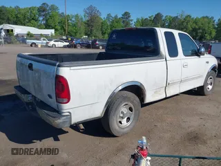 2002 Ford F-150 XL with VIN 1FTRX17272NA51467, listed as a IAAI auction lot 42095907 with 1 mi miles. Bid and sale history available at carsss.com. Image 4.