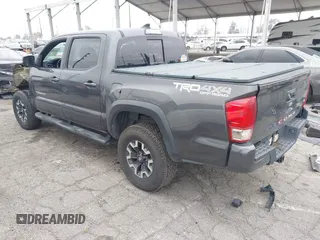 2017 Toyota Tacoma SR5 with VIN 3TMCZ5ANXHM100545, listed as a IAAI auction lot 41885721 with 108,565 mi miles. Bid and sale history available at carsss.com. Image 3.