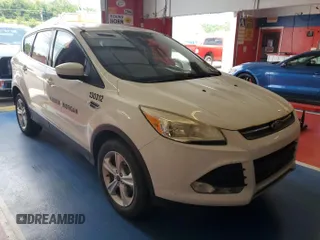 2013 Ford Escape SE with VIN 1FMCU9G92DUD72105, listed as a IAAI auction lot 42731657 with 213,477 mi miles and . Bid and sale history available at DreamBid. Image 27.