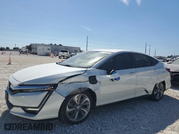 2018 Honda Clarity Plug-In Hybrid Touring with VIN JHMZC5F34JC012440, listed as a Copart auction lot 77122824 with 57,256 mi miles and Salvage Title. Bid and sale history available at carsss.com. Image 1.