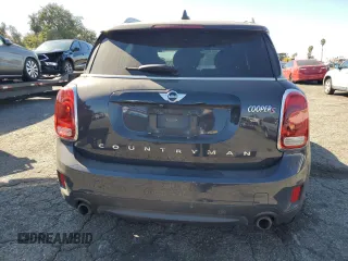 2018 MINI Countryman Cooper S with VIN WMZYT3C39J3E93214, listed as a Copart auction lot 77655444 with 101,401 mi miles and Salvage Title. Bid and sale history available at carsss.com. Image 6.