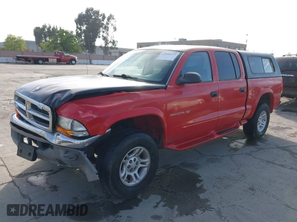 2001 Dodge Dakota Sport with VIN 1B7GG2AN51S148828, listed as a IAAI auction lot 42095653 with 232,995 mi miles and . Bid and sale history available at carsss.com. Image 2.