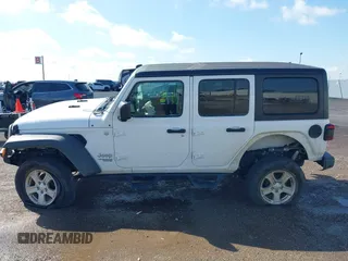 2020 Jeep Wrangler Unlimited Sport with VIN 1C4HJXDM2LW262867, listed as a IAAI auction lot 42303520 with 56,461 mi miles and . Bid and sale history available at DreamBid. Image 14.