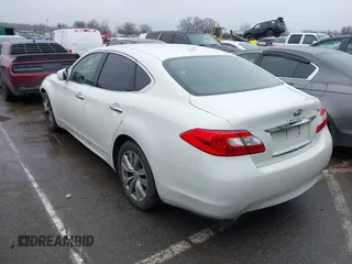 2013 Infiniti M with VIN JN1BY1AP2DM511813, listed as a IAAI auction lot 41577968 with 191,608 mi miles and . Bid and sale history available at DreamBid. Image 3.