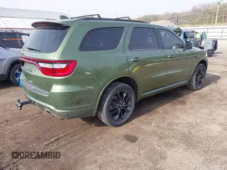 2021 Dodge Durango GT Plus with VIN 1C4RDJDGXMC663928, listed as a IAAI auction lot 42070119 with 77,110 mi miles and . Bid and sale history available at DreamBid. Image 4.
