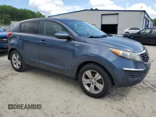 2012 Kia Sportage LX with VIN KNDPBCA27C7330112, listed as a Copart auction lot 59872465 with 220,929 mi miles and Clean title. Bid and sale history available at DreamBid. Image 4.
