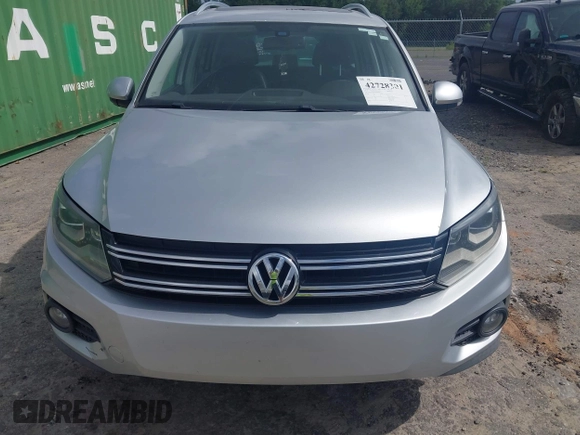 2013 Volkswagen Tiguan S with VIN WVGAV3AX9DW566269, listed as a IAAI auction lot 42728301 with 159,903 mi miles and . Bid and sale history available at DreamBid. Image 6.
