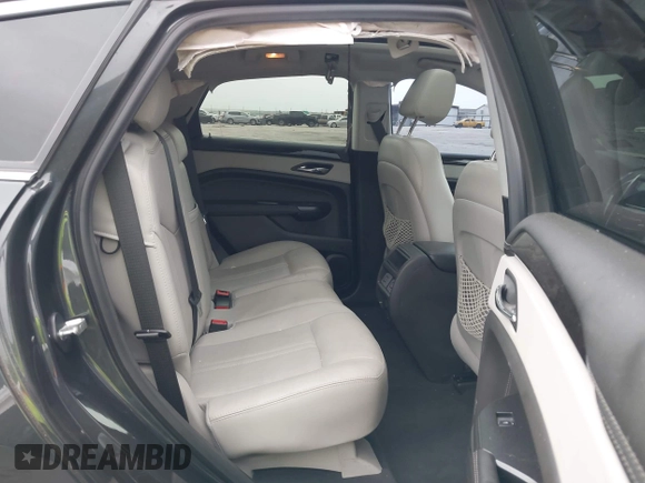 2014 Cadillac SRX Luxury Collection with VIN 3GYFNBE32ES631269, listed as a IAAI auction lot 41908855 with 55,154 mi miles and . Bid and sale history available at carsss.com. Image 8.