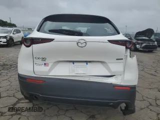 2023 Mazda CX-30 S with VIN 3MVDMBAM8PM557537, listed as a Copart auction lot 61154835 with 23,450 mi miles and Salvage title. Bid and sale history available at DreamBid. Image 6.