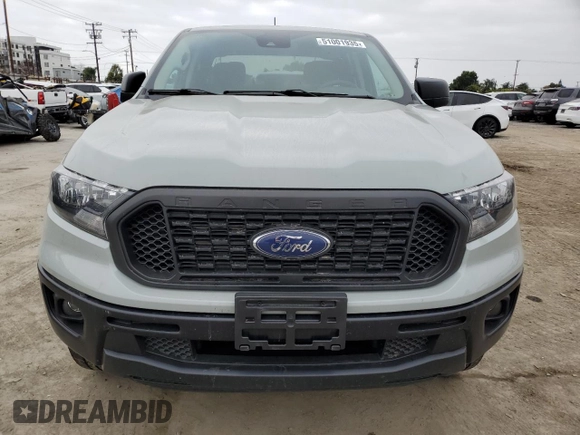 2023 Ford Ranger XL with VIN 1FTER4EH8PLE25251, listed as a Copart auction lot 51001935 with 39,928 mi miles and Salvage Title. Bid and sale history available at DreamBid. Image 5.