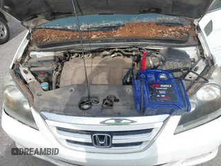 2007 Honda Odyssey EX-L with VIN 5FNRL38787B051582, listed as a IAAI auction lot 42104718 with 193,630 mi miles and . Bid and sale history available at DreamBid. Image 10.